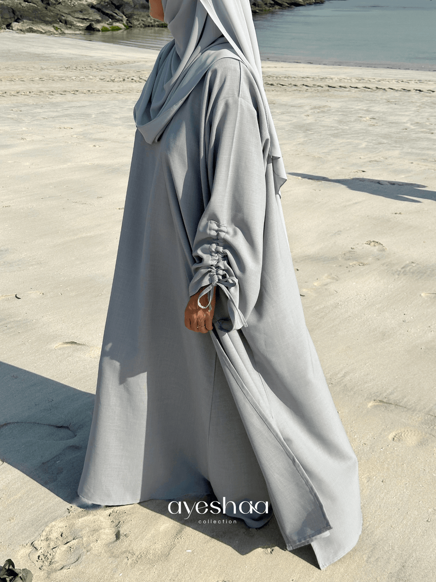 abaya bleu, abaya grise abaya Dubai, hijab bleu, hijab line, abaya papillon, abaya lin, abaya dubai, abaya été, jennah boutique, classy mastour, master, abaya moderne, abaya petite taille, abaya grande taille