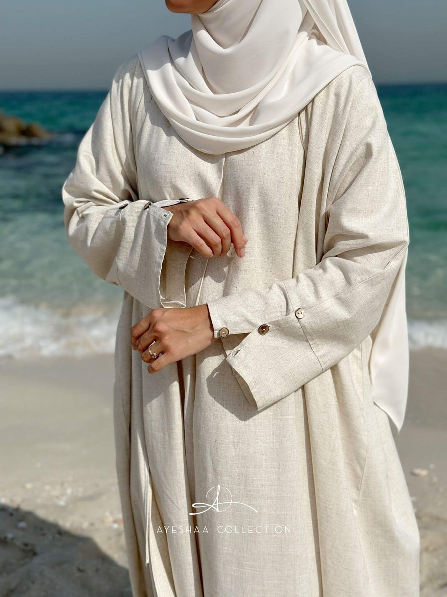 abaya blanche, abaya beige, abaya off-white, abaya ivoire, abaya été, summer abaya, jilbeb ivoire, hijab ivoire, khimar ivoire, ensemble lin, abaya lin, abaya allaitement, femme musulmane, robe islamique, abaya dubai, mastour,
