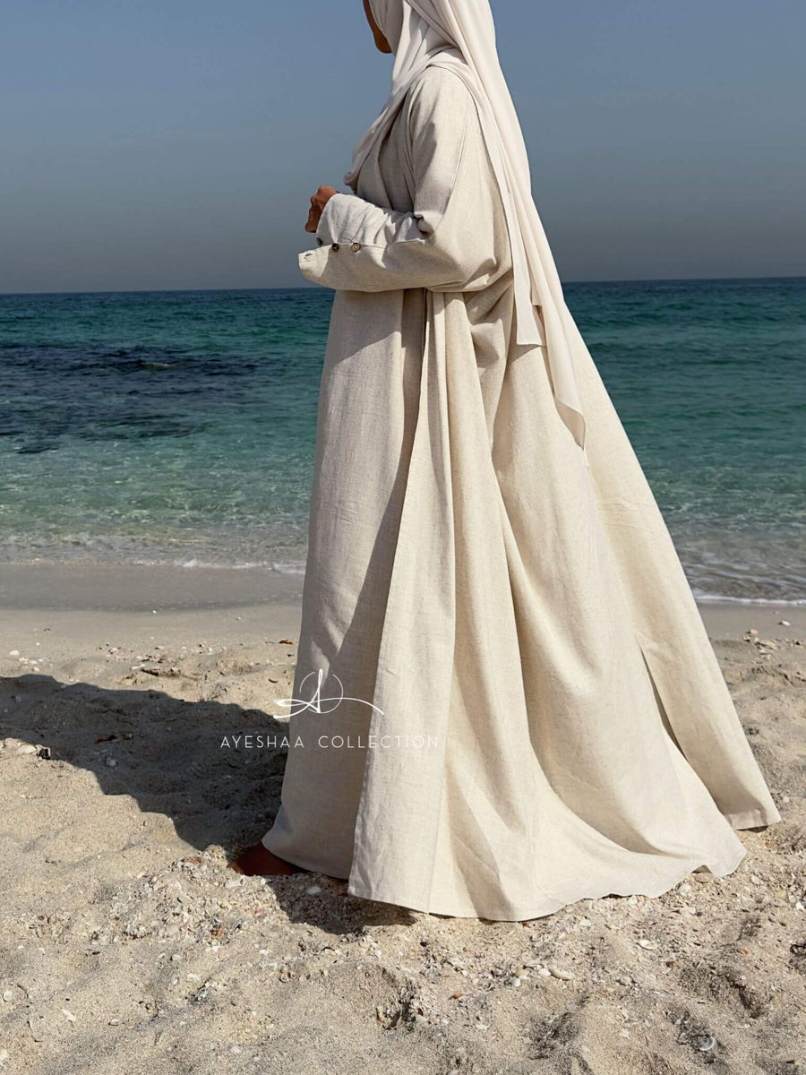 abaya blanche, abaya beige, abaya off-white, abaya ivoire, abaya été, summer abaya, jilbeb ivoire, hijab ivoire, khimar ivoire, ensemble lin, abaya lin, abaya allaitement, femme musulmane, robe islamique, abaya dubai, mastour,